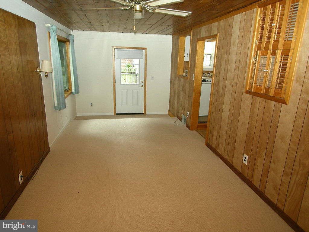 2510 Sheraton Street Silver Spring, MD 20906 - Photo 9 of 21 a view of a hallway with a chandelier