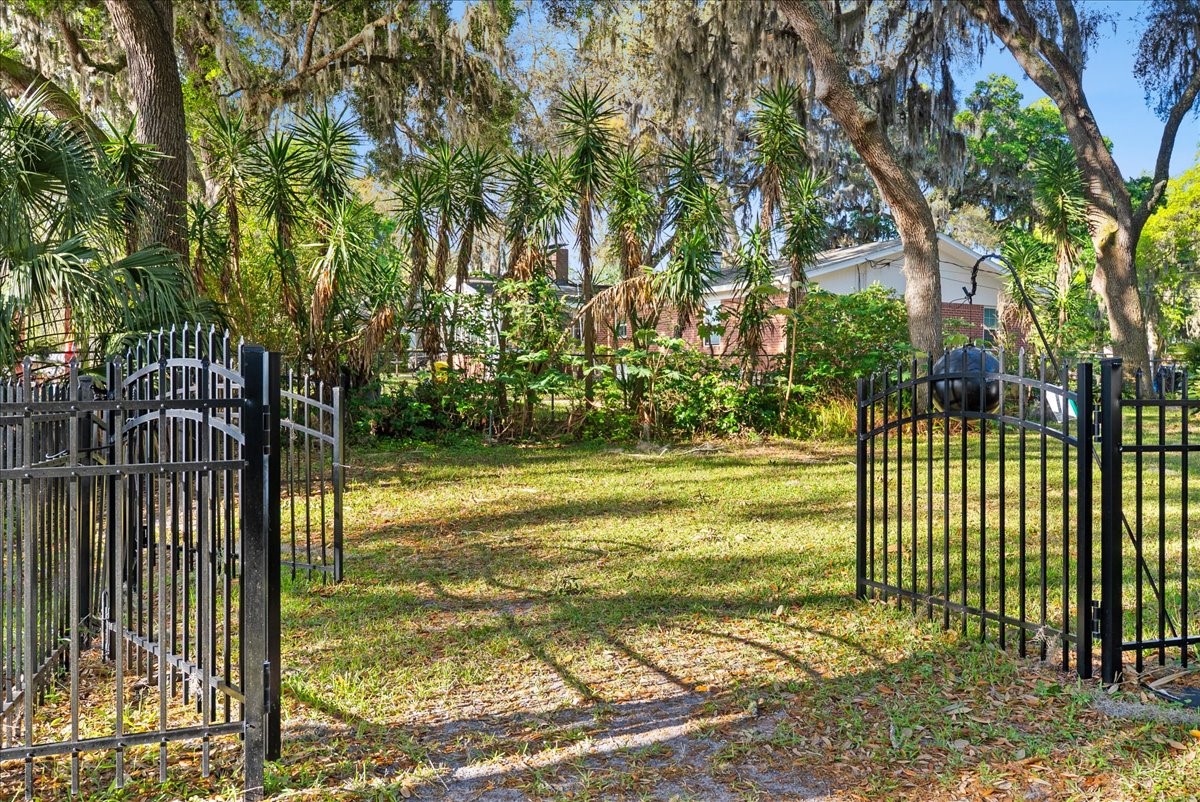 85316 Avant Road Yulee, FL 32097 - Photo 50 of 62 a view of a garden with a small yard