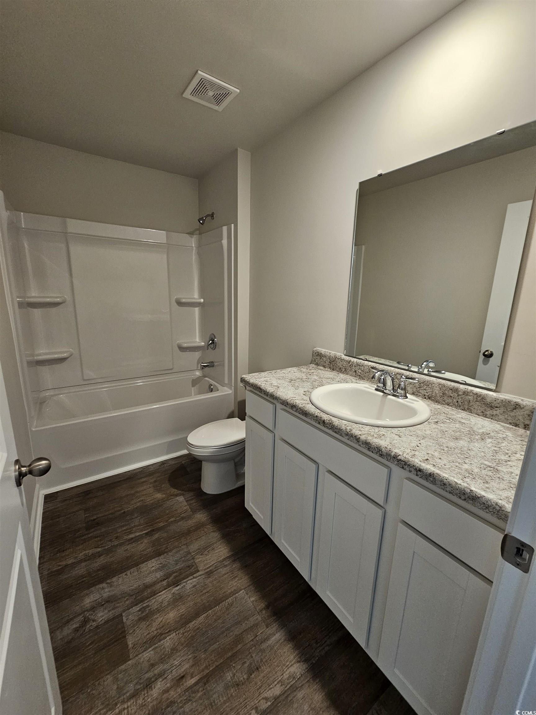 374 Jeff Waters Circle Longs, SC 29568 - Photo 14 of 22 Bathroom with wood finished floors, tub / shower c