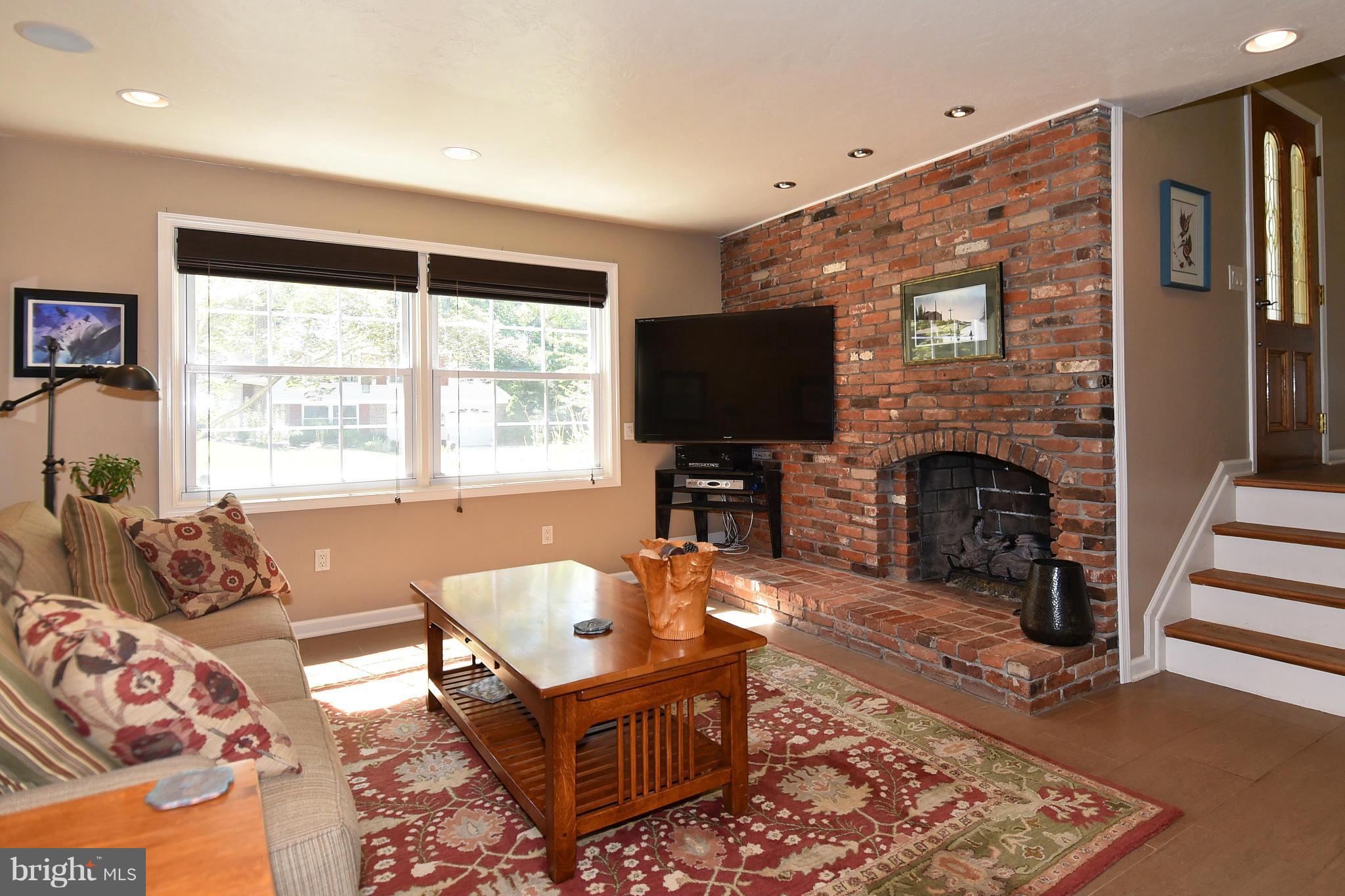 2116 Countryside Drive Silver Spring, MD 20905 - Photo 15 of 30 Family room with gas fireplace