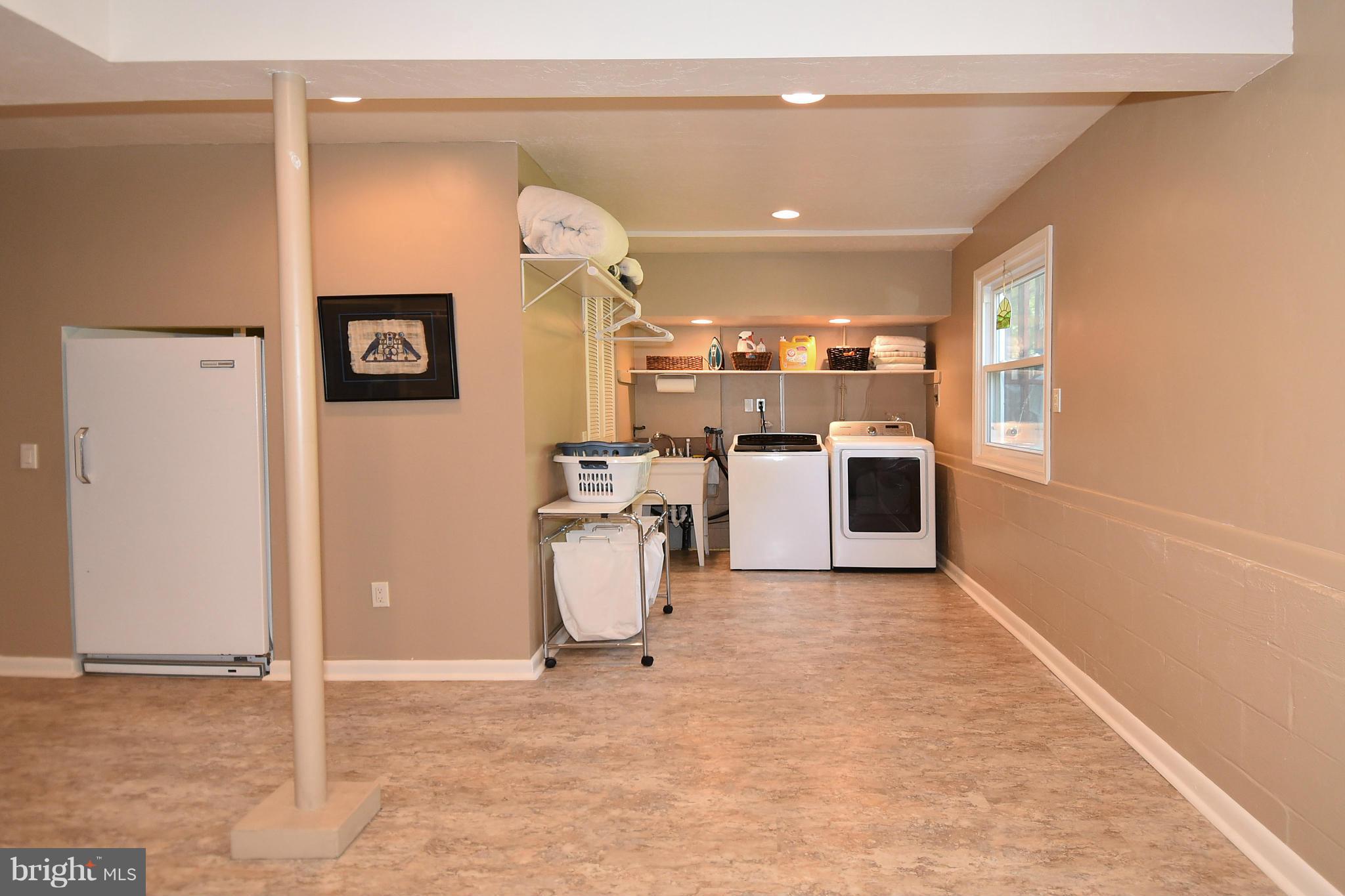 2116 Countryside Drive Silver Spring, MD 20905 - Photo 18 of 30 Large rec/laundry room in basement