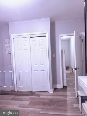 a bathroom with a toilet and a bathtub