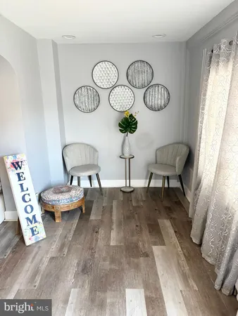 a living room with furniture and window