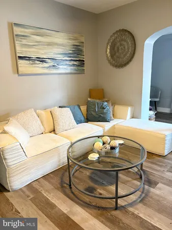 a living room with a couch and a table