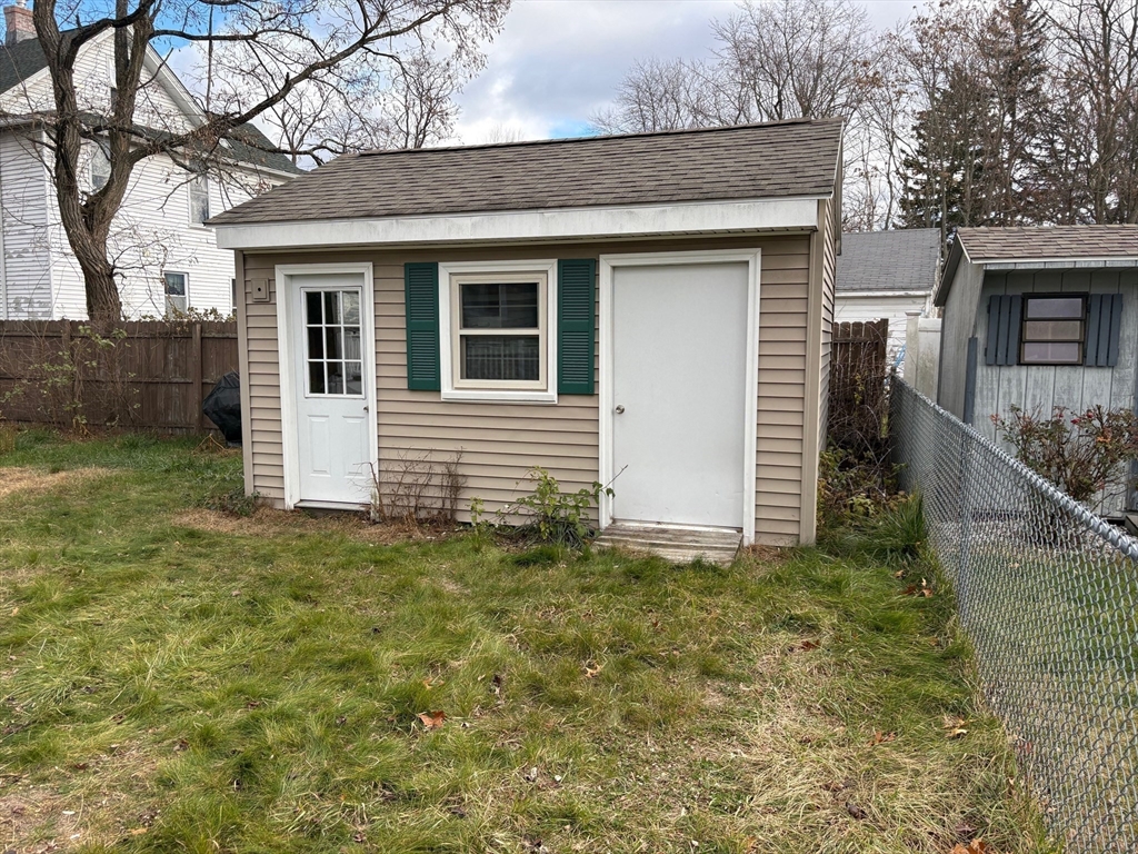 15 Hudson Avenue Chicopee, MA 01020 - Photo 4 of 7 a house view with a backyard space