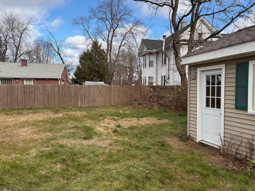 15 Hudson Avenue Chicopee, MA 01020 - Photo 5 of 7 a view of a house with a yard