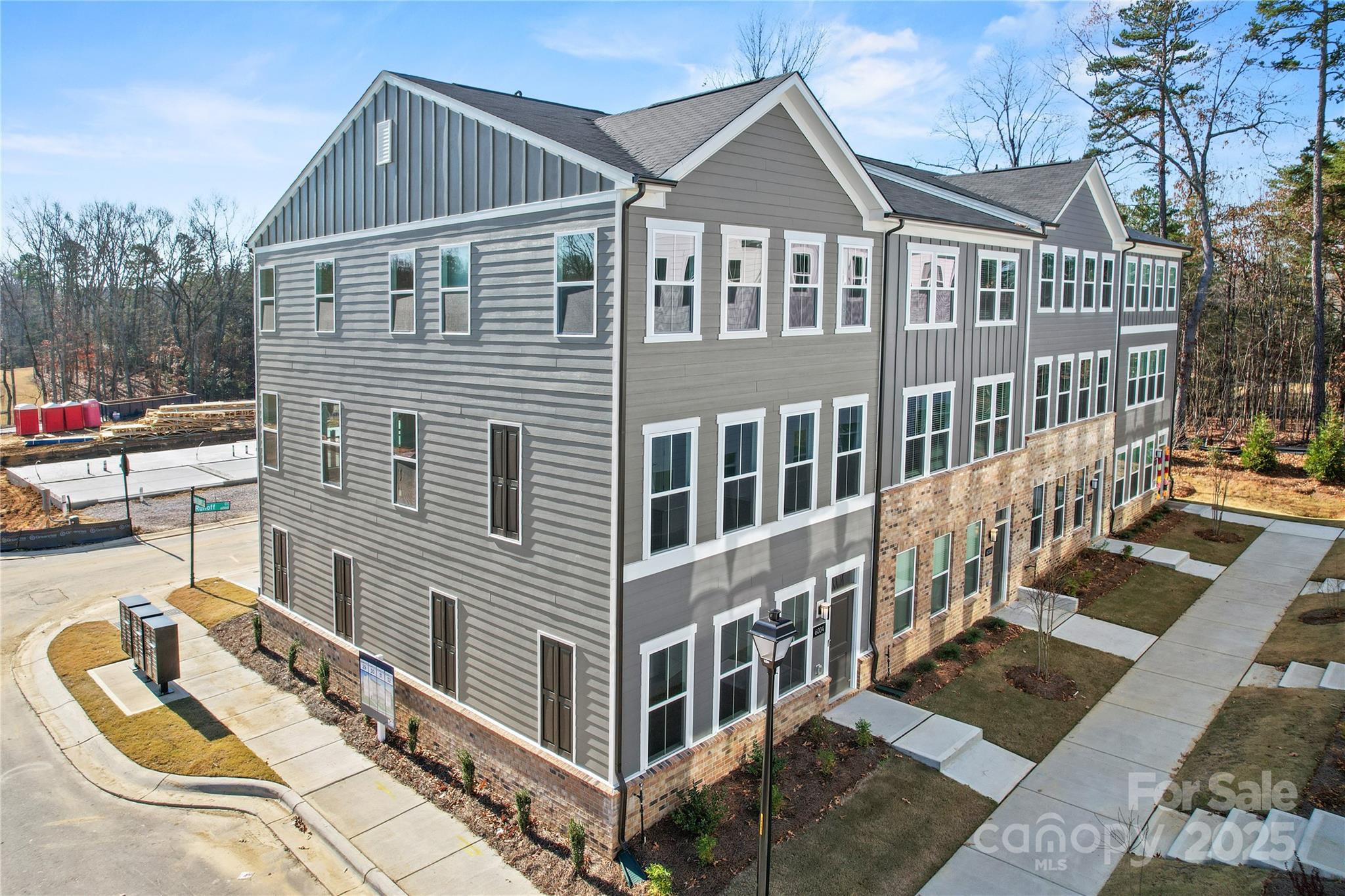 6004 Runoff Court Charlotte, NC 28262 - Photo 7 of 11 a view of a house with a yard