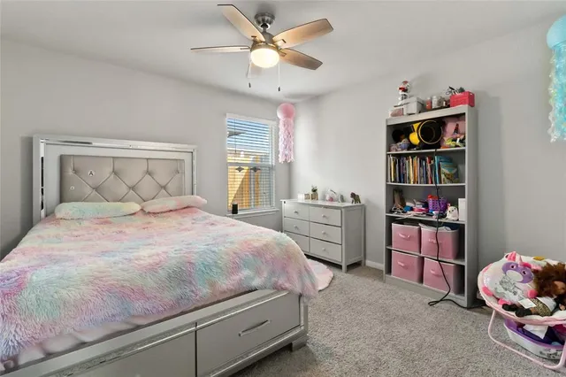 a bedroom with a bed and closet