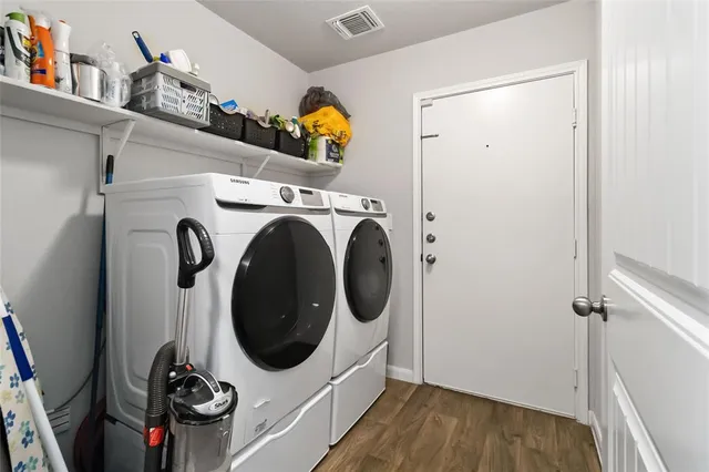 a utility room with dryer and washer
