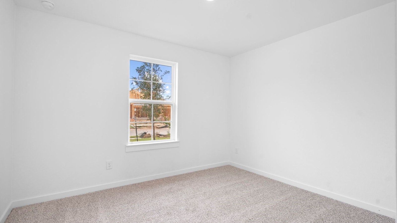 13 Robin Court Angleton, TX 77515 - Photo 18 of 27 an empty room with a window