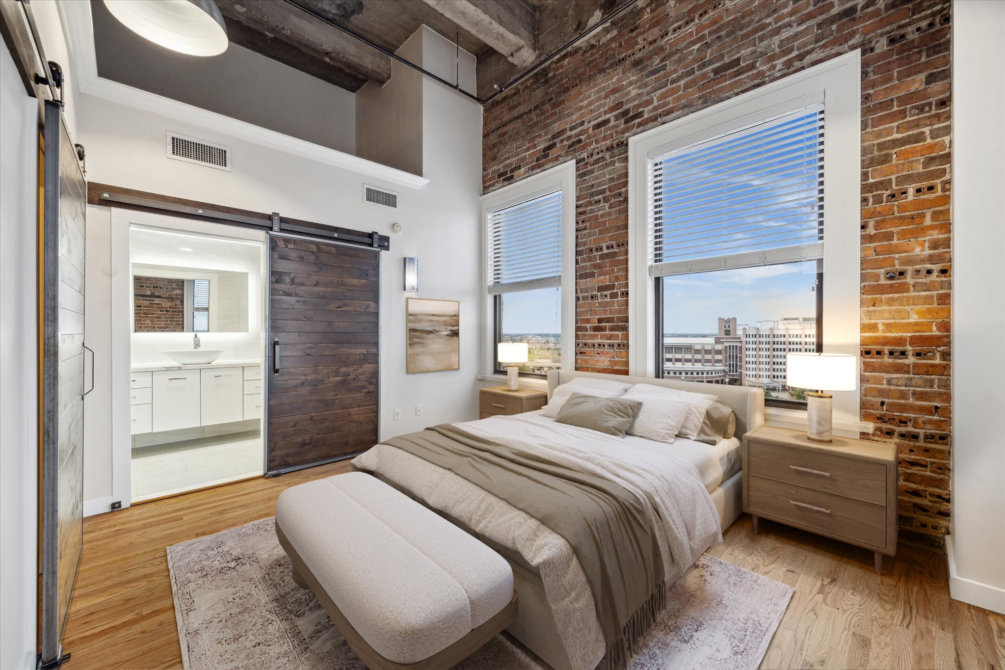 915 Franklin Street, Unit 9I Houston, TX 77002 - Photo 11 of 23 a bedroom with a bed and a large window