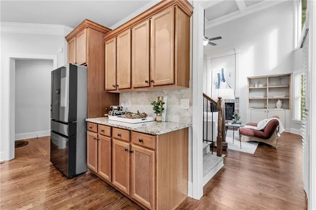 a bedroom with a bed and cabinets