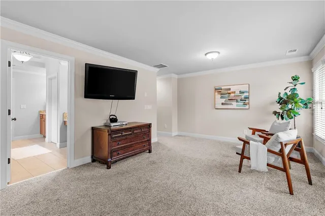 a living room with furniture and a table