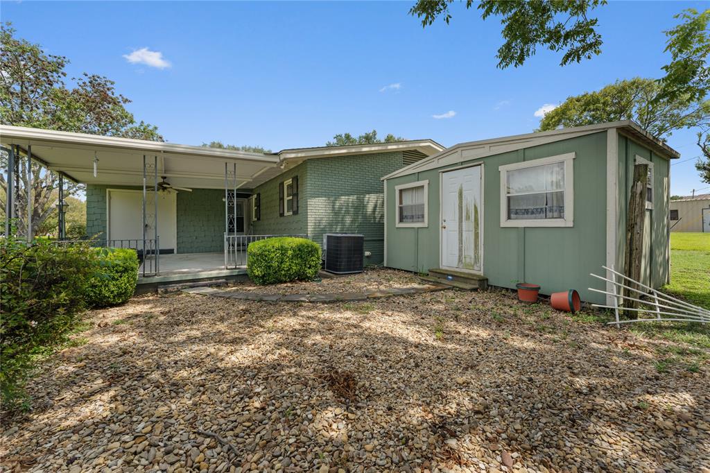 3216 MacArthur Drive Waco, TX 76708 - Photo 14 of 39 a front view of a house with a yard