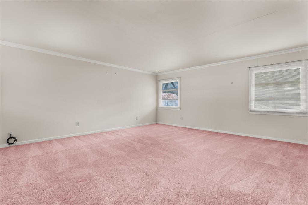 3216 MacArthur Drive Waco, TX 76708 - Photo 17 of 39 an empty room with windows