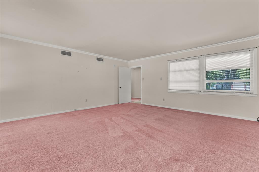 3216 MacArthur Drive Waco, TX 76708 - Photo 2 of 39 a view of an empty room with a window