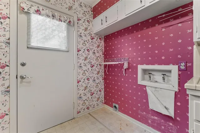 a bathroom with a granite countertop sink a large mirror and a shower