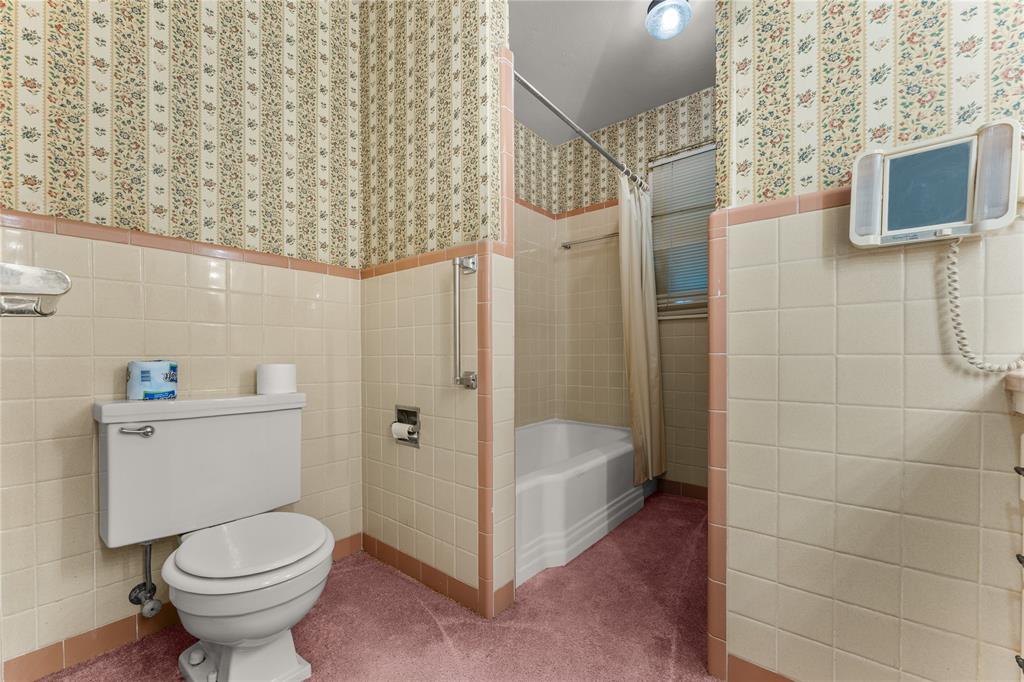 3216 MacArthur Drive Waco, TX 76708 - Photo 30 of 39 a bathroom with a toilet and a shower