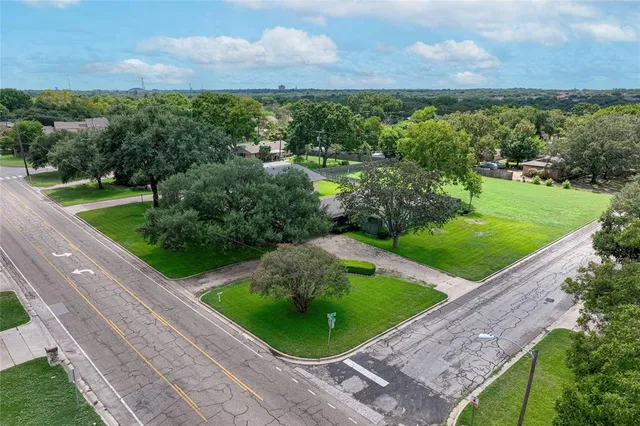 a view of a garden from a balcony