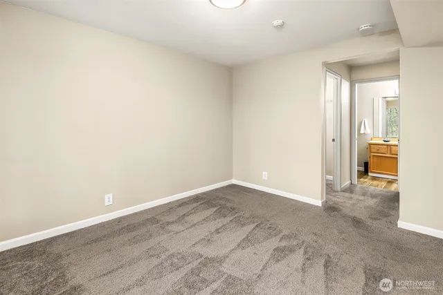 an empty room with a hallway