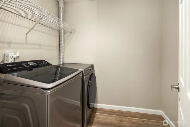 a bathroom with a sink and washing machine