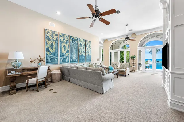 a view of a livingroom with furniture and a chandelier