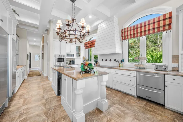 a bathroom with a sink a mirror and a shower