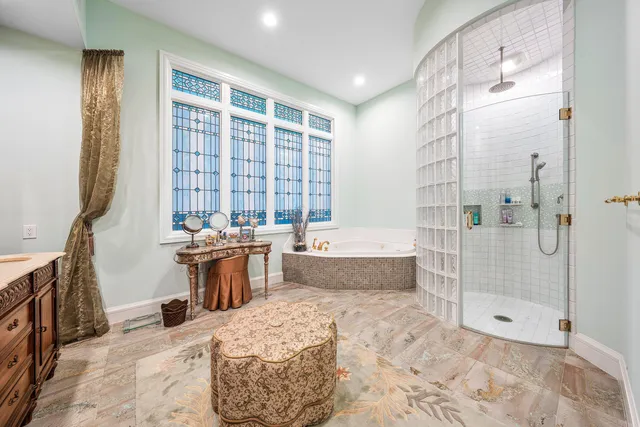 a bed room with a bed and a chandelier