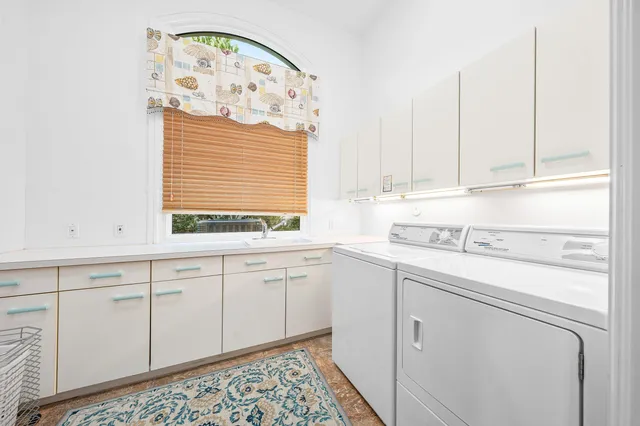 a spacious bedroom with a bed and a couch