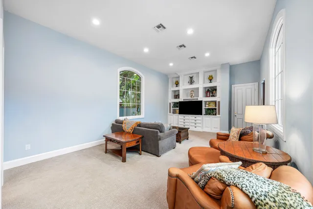 a bathroom with a sink a mirror and shower
