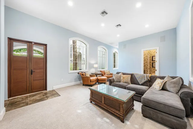 a view of a swimming pool with a patio