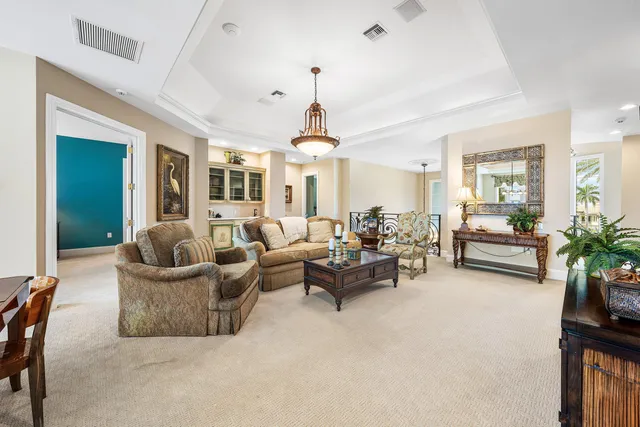 a front view of a house with garden and porch