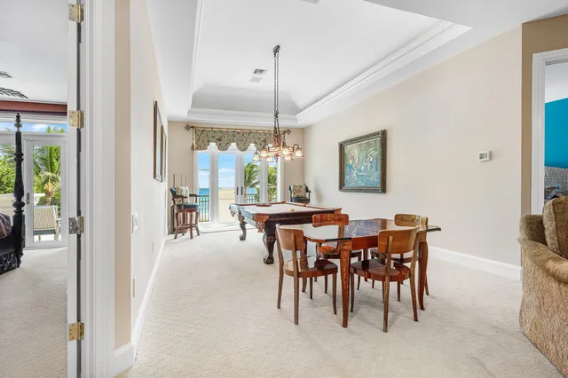 a view of a swimming pool with a yard