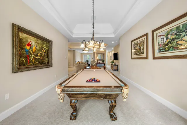 a view of a house with swimming pool and a big yard