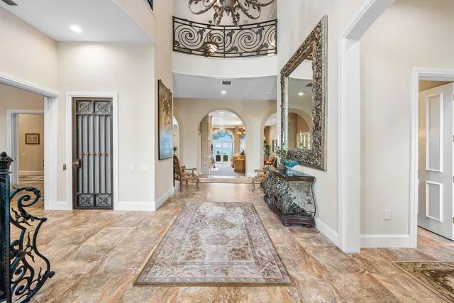a view of a livingroom from dining room and wooden floor