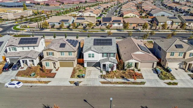 an aerial view of a building with outdoor space