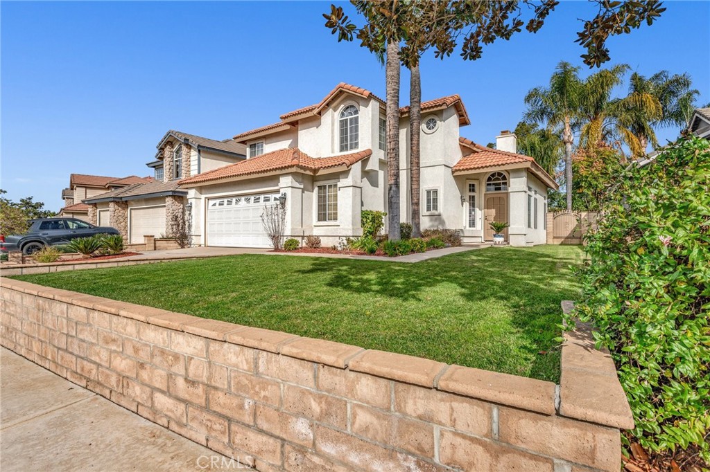 19950 Westerly Drive Riverside, CA 92508 - Photo 1 of 1 a front view of a house with a yard