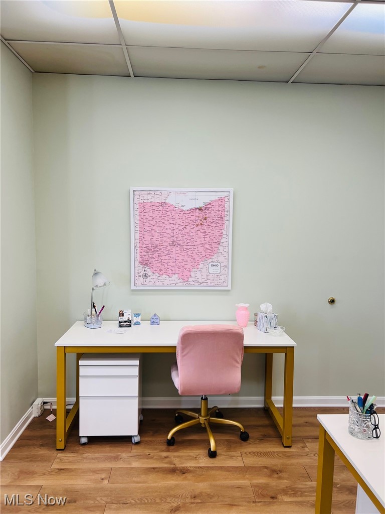1 South Main Street Rittman, OH 44270 - Photo 5 of 13 Office area with a drop ceiling and light wood-style floors