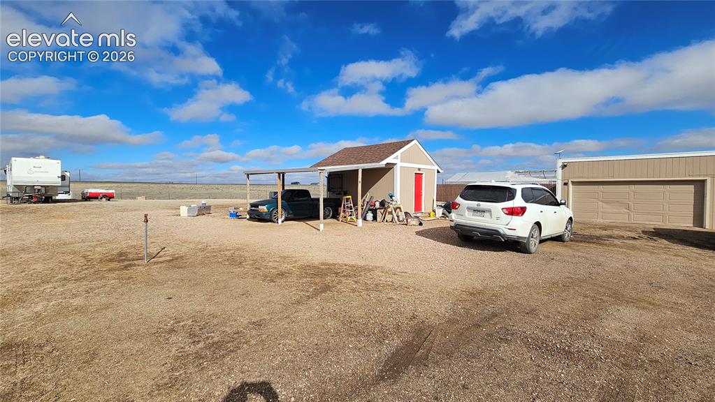 3835 Sengbeil Road Yoder, CO 80864 - Photo 11 of 48 a view of car parked in front of house