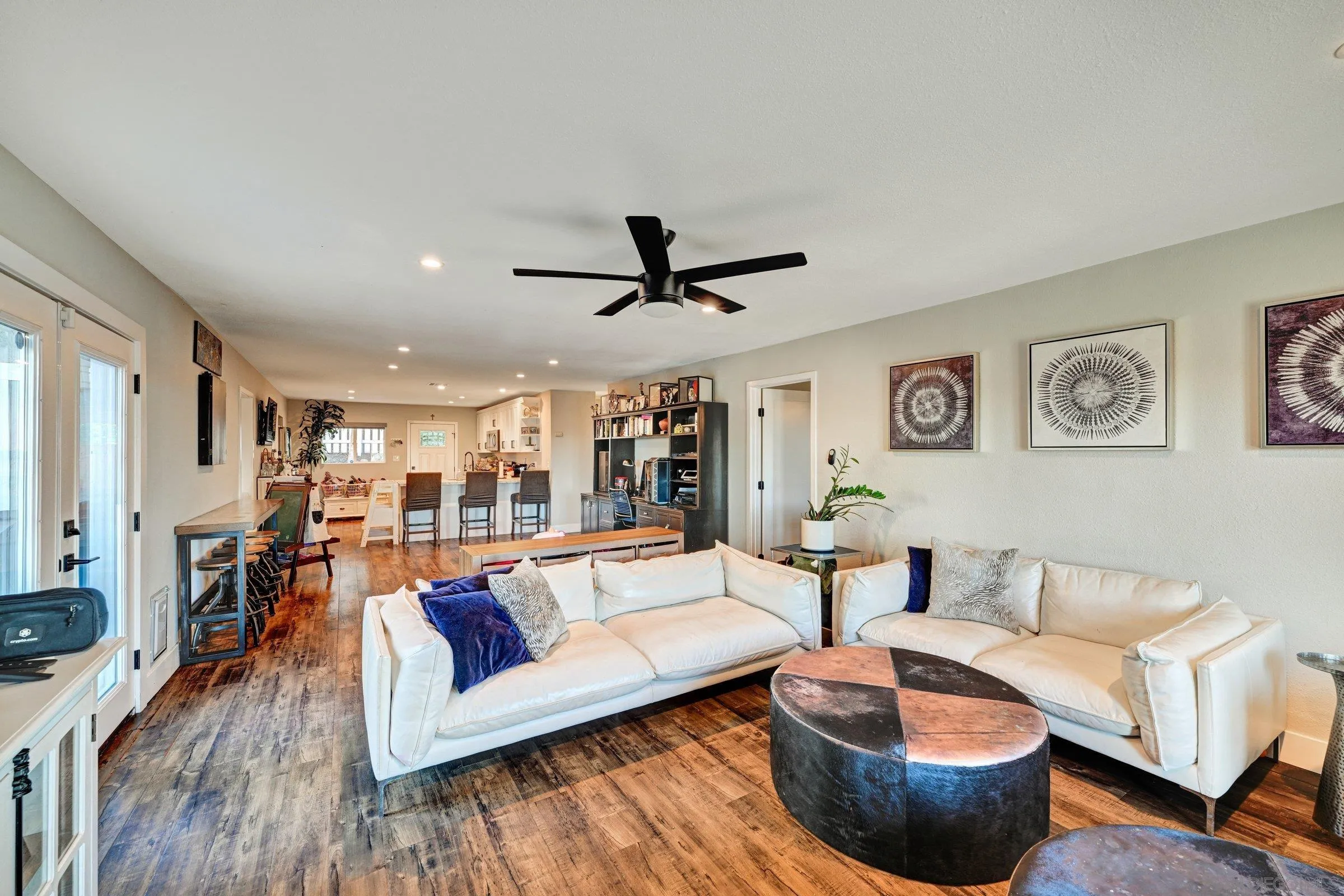 2312 Helix Street Spring Valley, CA 91977 - Photo 26 of 46 a living room with furniture and a wooden floor