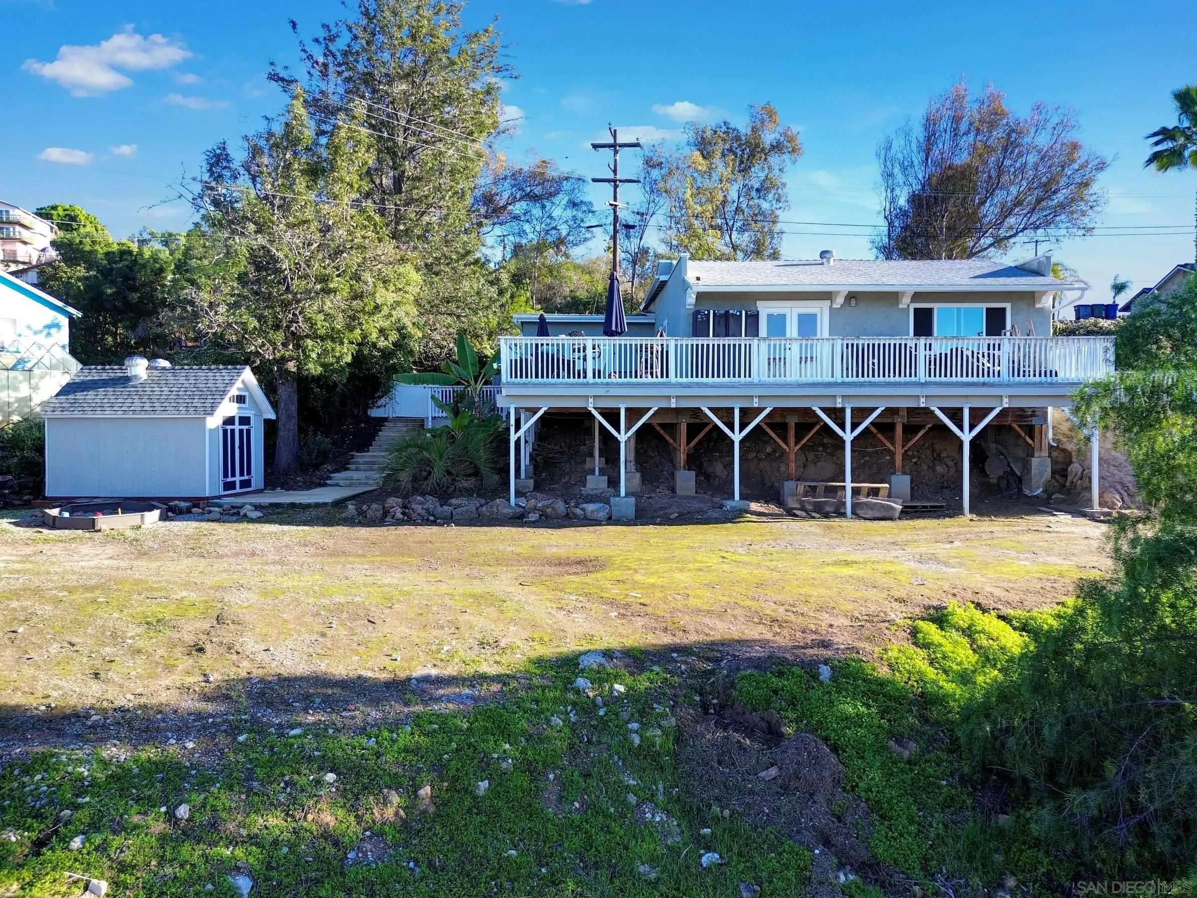 2312 Helix Street Spring Valley, CA 91977 - Photo 3 of 46 a front view of house with yard and swimming pool