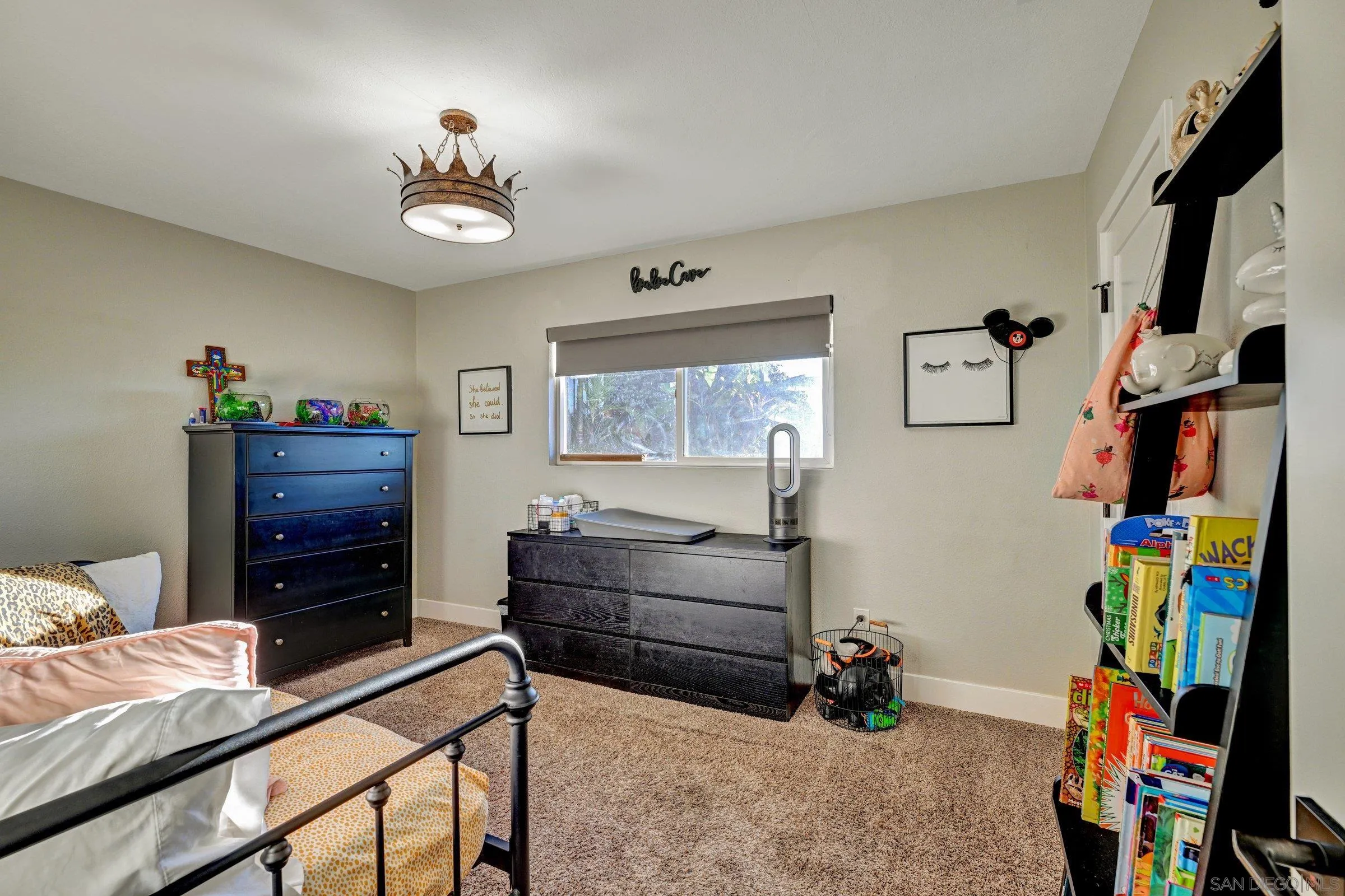 2312 Helix Street Spring Valley, CA 91977 - Photo 33 of 46 a bedroom with furniture and a window