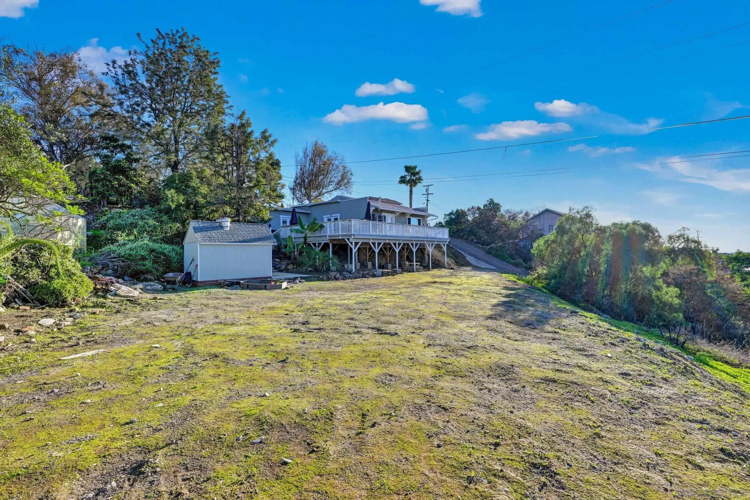 2312 Helix Street Spring Valley, CA 91977 - Photo 6 of 46 a view of a house with a yard