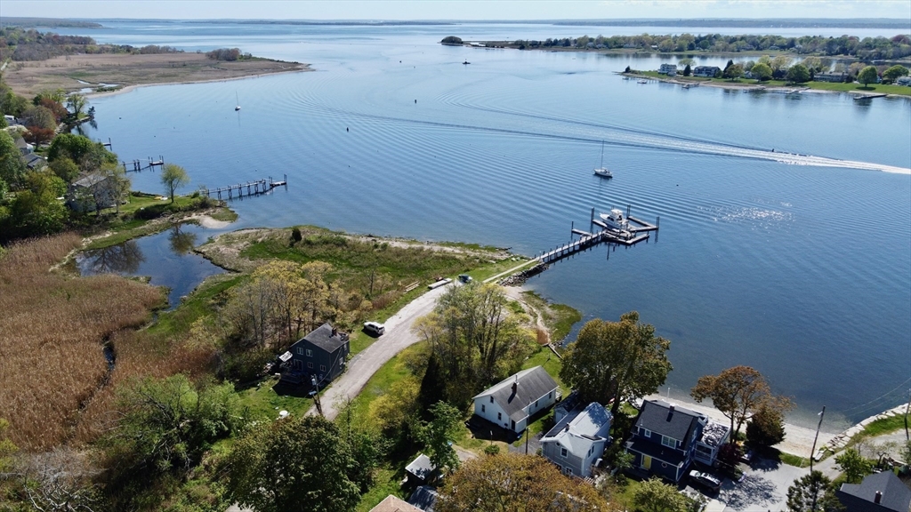 66 R Beach Street Warren, RI 02885 - Photo 4 of 15 an aerial view of a house with a lake view