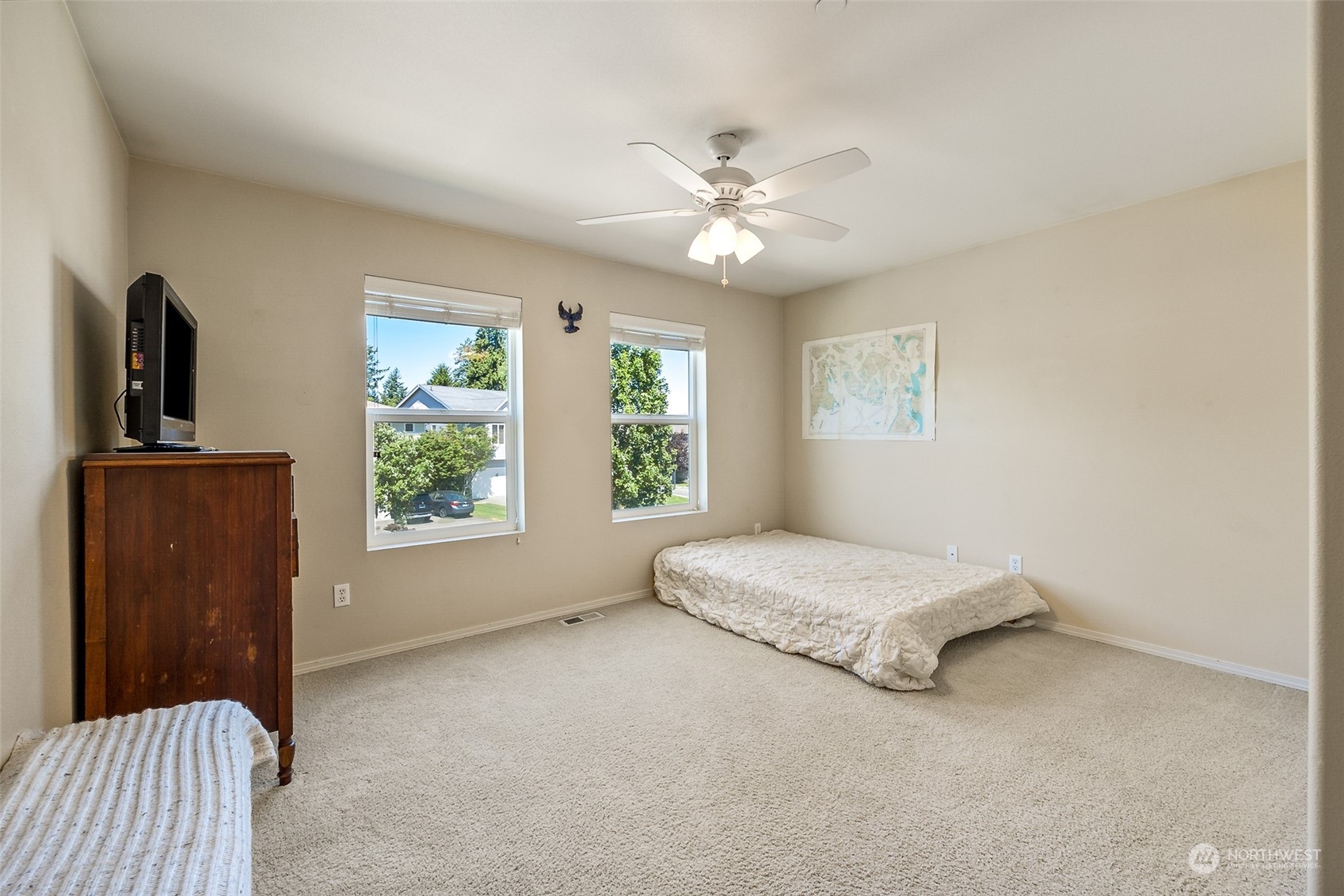 1345 Foreman Road DuPont, WA 98327 - Photo 15 of 34 a living room with a bed furniture and a window