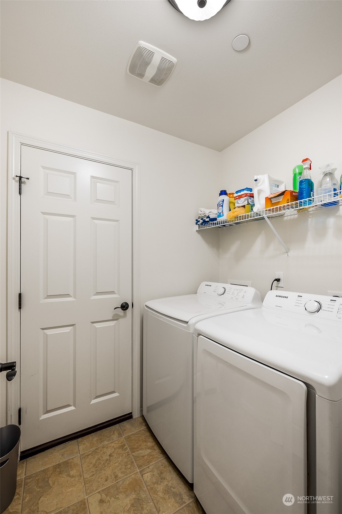1345 Foreman Road DuPont, WA 98327 - Photo 17 of 34 a view of storage and utility room with washer and dryer