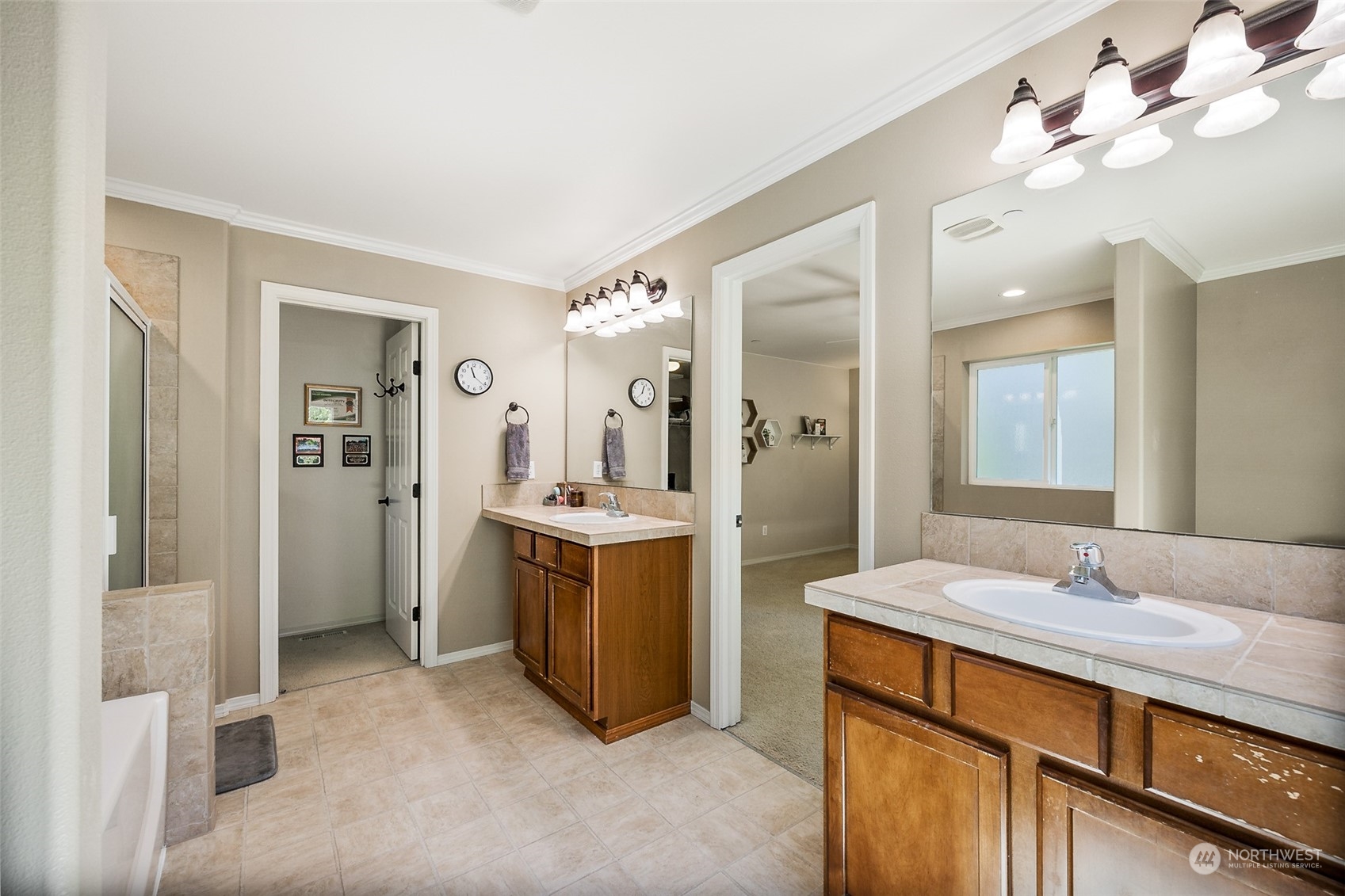1345 Foreman Road DuPont, WA 98327 - Photo 21 of 34 a bathroom with a double vanity sink mirror and refrigerator