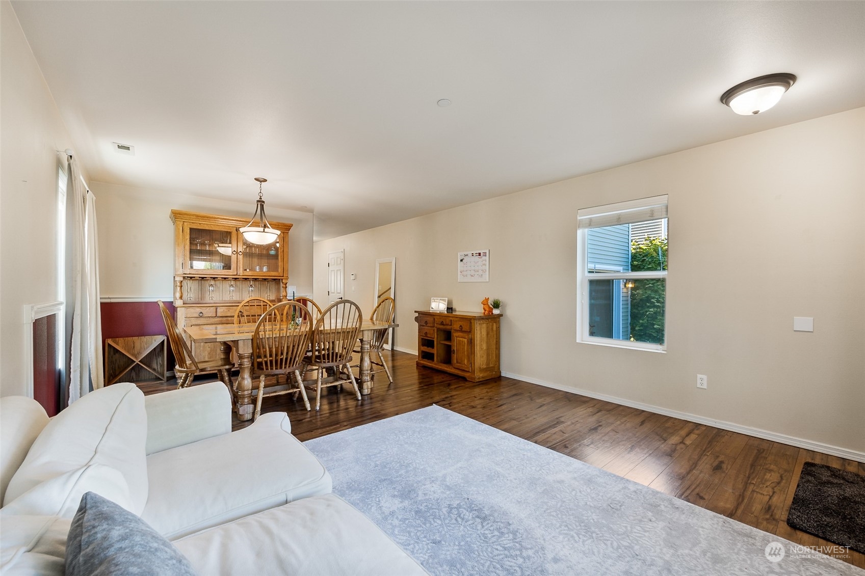 1345 Foreman Road DuPont, WA 98327 - Photo 3 of 34 a living room with furniture window and potted plants on the table