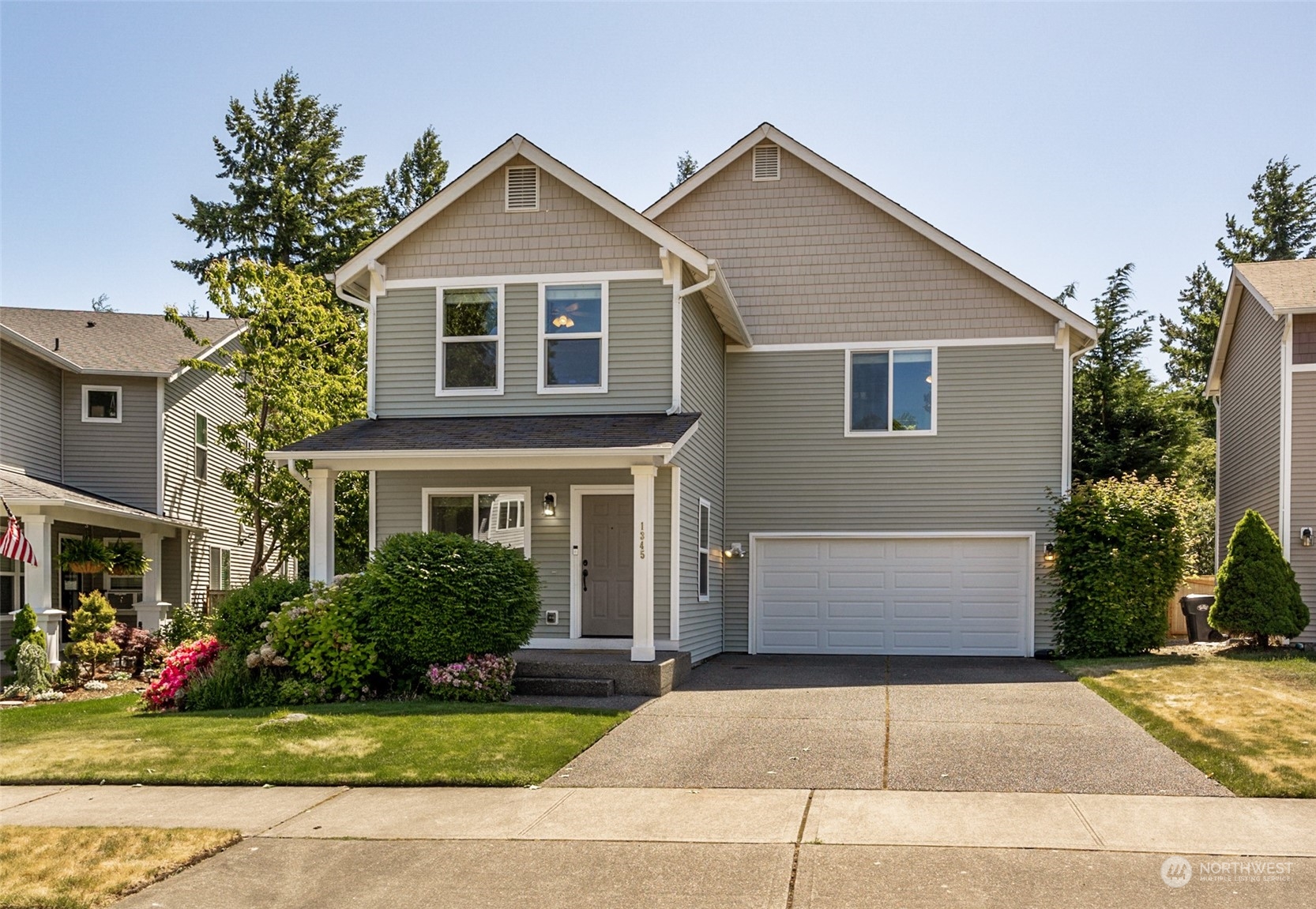 1345 Foreman Road DuPont, WA 98327 - Photo 33 of 34 a front view of a house with a yard
