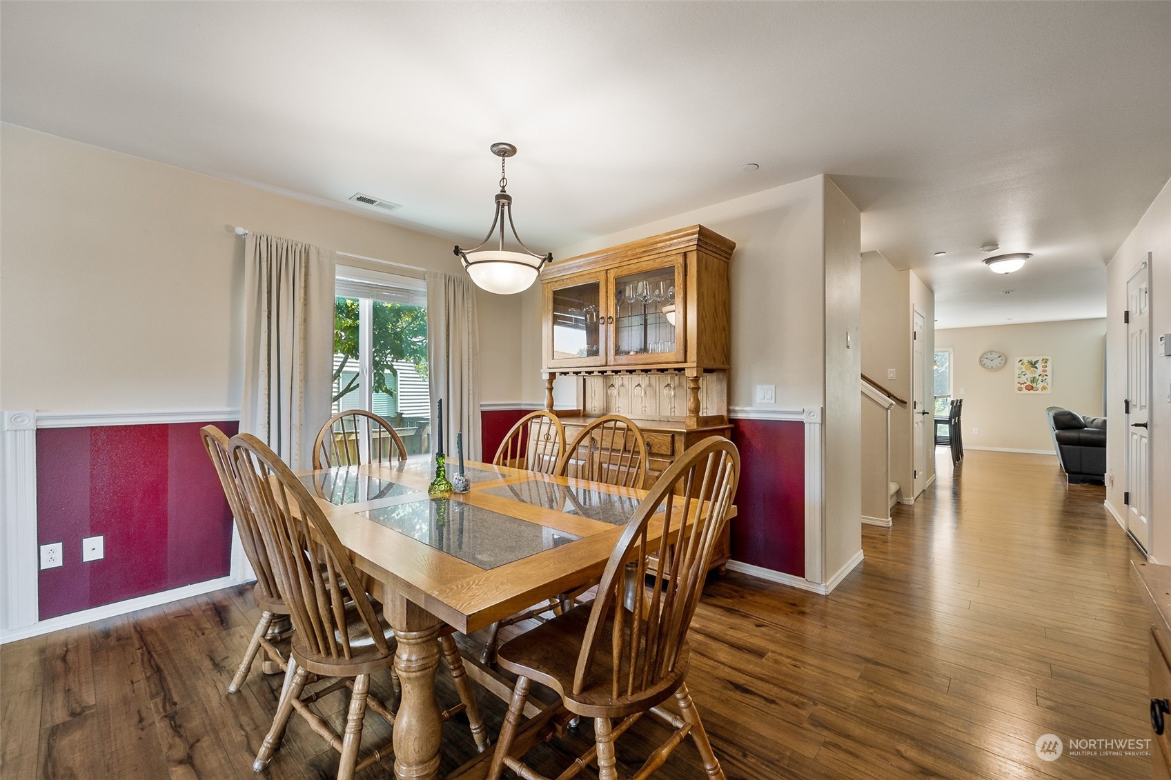 1345 Foreman Road DuPont, WA 98327 - Photo 4 of 34 a view of a dining room with furniture window and wooden floor